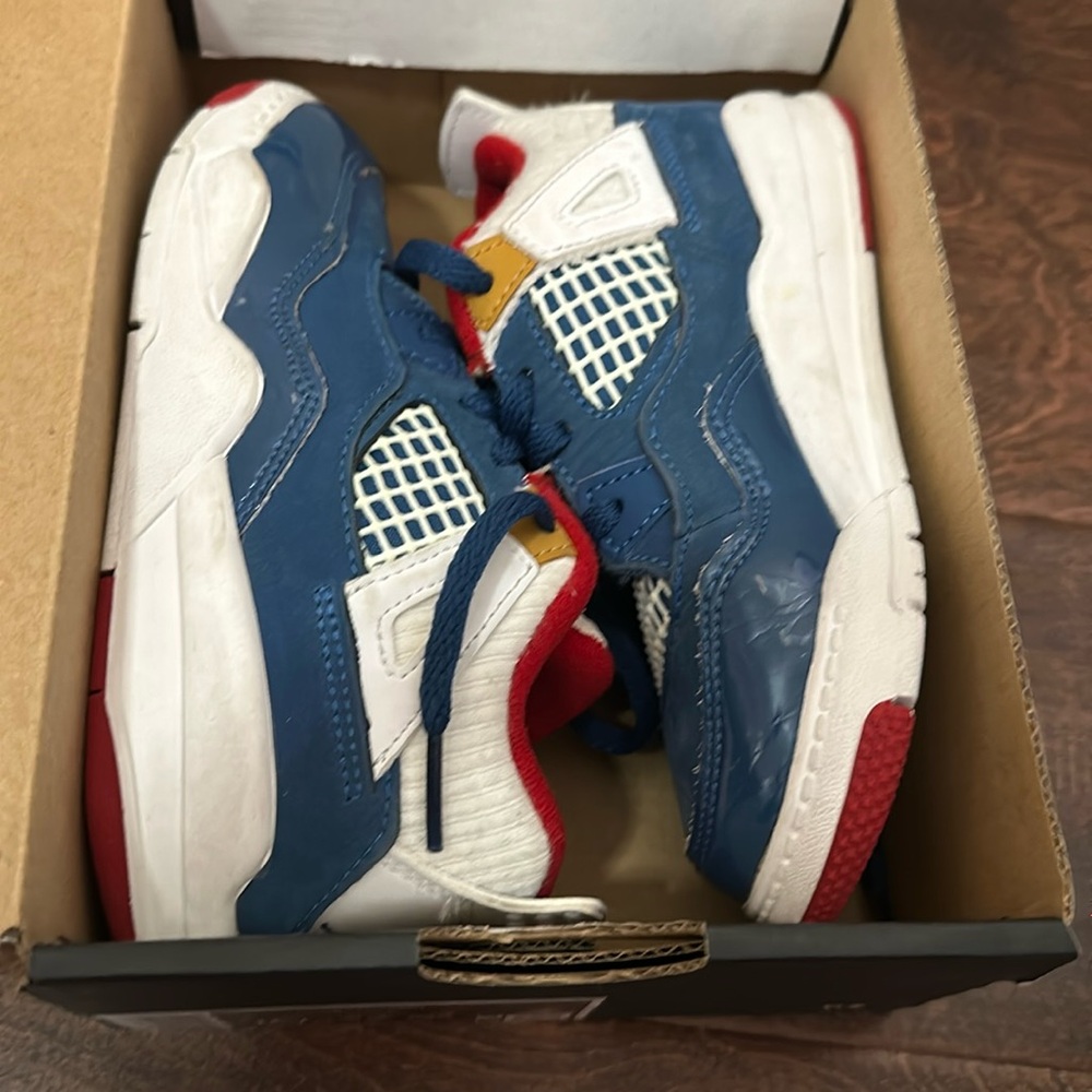 Jordan 4 retro toddler. Size 10. Color: French blue/white-gym red.